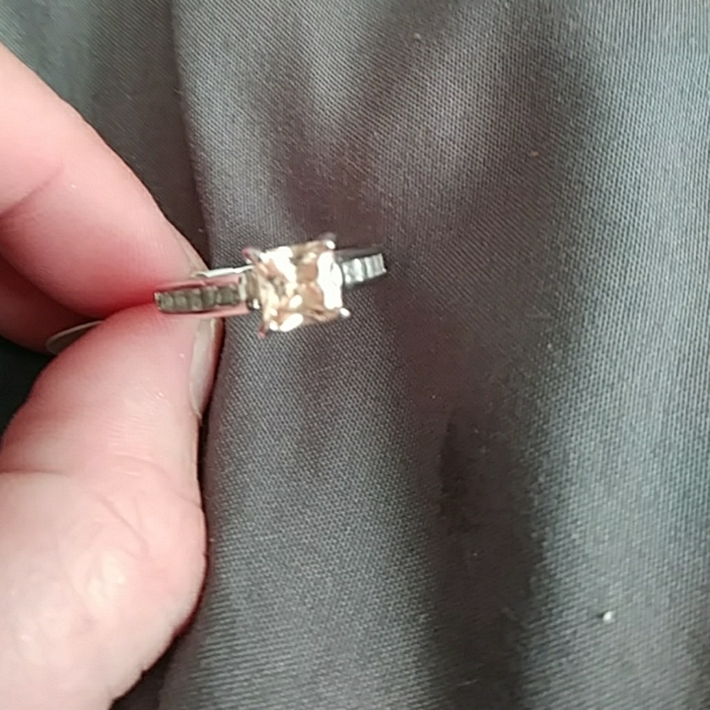 Silver ring with peach colored stone